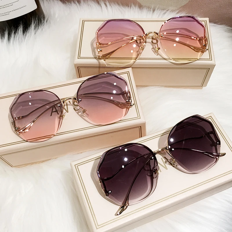 Ir 2021. Jaunā Sieviešu Saulesbrilles bez apmales UV400 Zīmola Dizainere Augstas Kvalitātes Slīpums Saules Brilles Sieviešu oculos